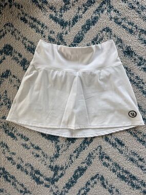 VUORI BUNDLE OF FOUR SKORTS White Black Off White Brown